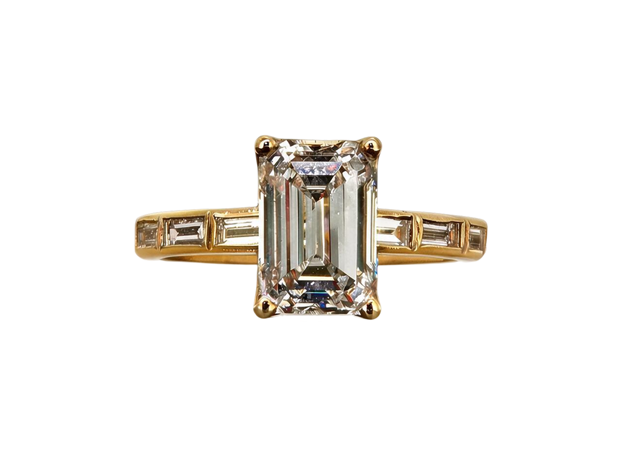 A yellow gold ring featuring a large emerald-cut clear center stone with baguette side stones, set against a plain white background.